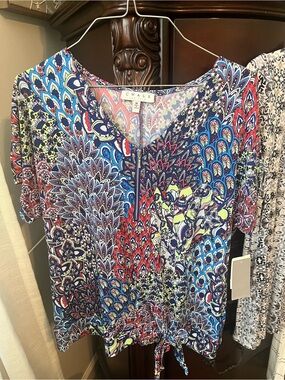 Women’s Bundle tops. 
Most of them have tags. New. The other top’s worn once!